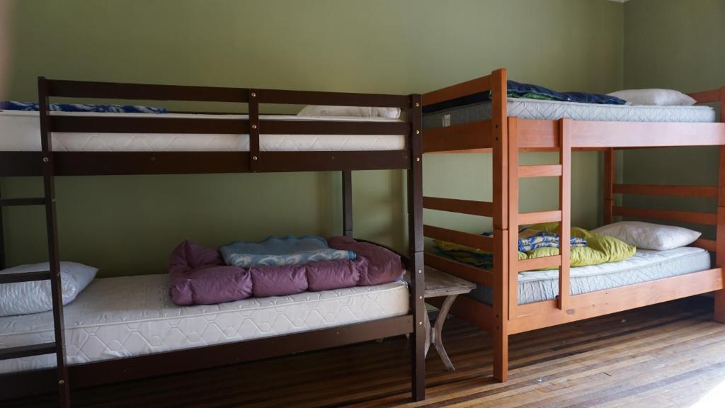 Voodi või voodid majutusasutuse Ventana Sur Hostal toas