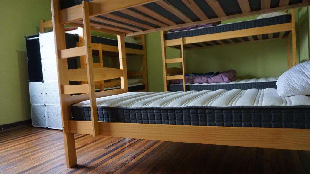 Voodi või voodid majutusasutuse Ventana Sur Hostal toas