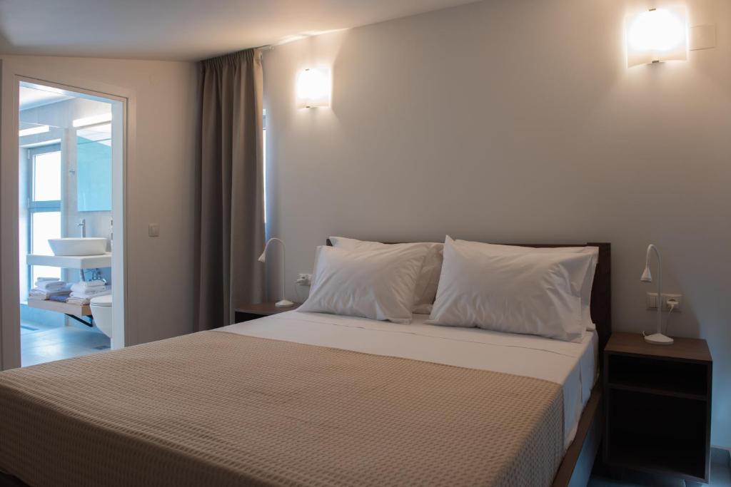 Postel nebo postele na pokoji v ubytování KaDeView Luxury