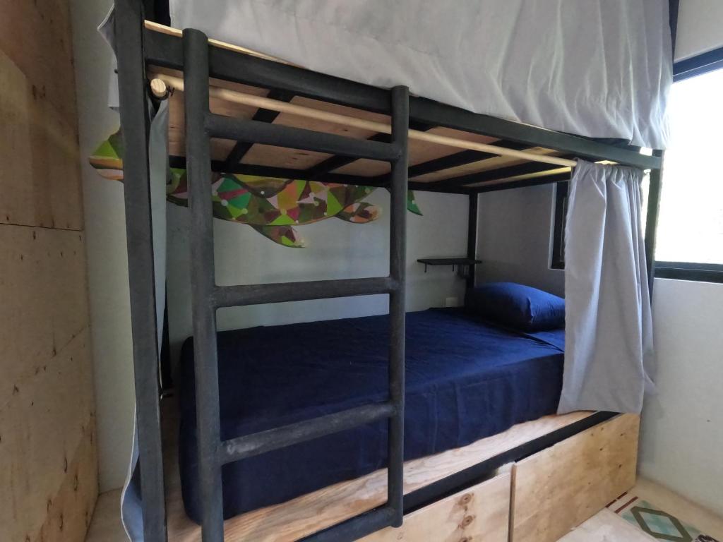 Postel nebo postele na pokoji v ubytování Maui Hostels Tulum
