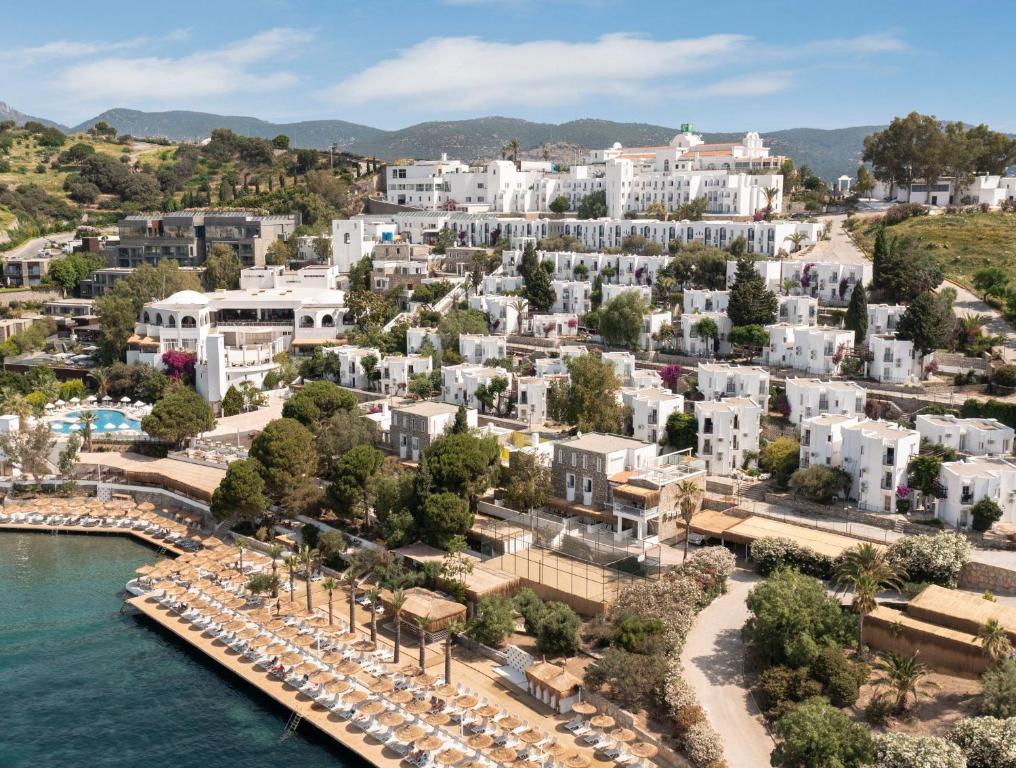 una vista aerea di una città vicino all'acqua di Holiday Inn Resort Bodrum, an IHG Hotel- Ultra All Inclusive a Bodrum City