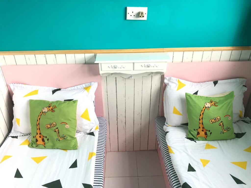 Postel nebo postele na pokoji v ubytování 香港名都商务旅馆 Ming Du Guesthouse