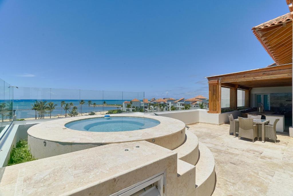 Photo inspiration: Gallery Detail: Spectacular Beachfront Penthouse W Private Jacuzzi At Cap Cana Пунта
