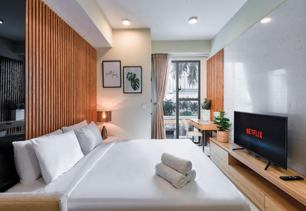 Postel nebo postele na pokoji v ubytování S Lux Apartment