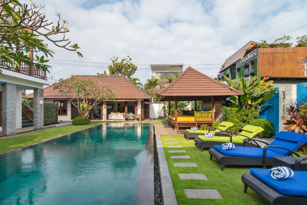 an image of a swimming pool at a villa at Villa Bon Bon in Canggu