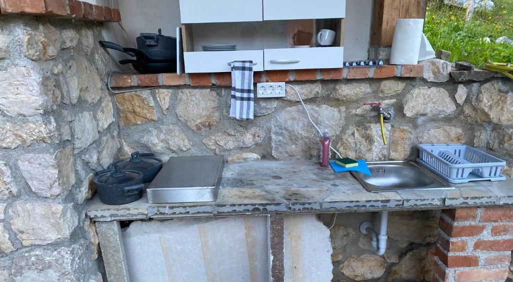 Köök või kööginurk majutusasutuses Posestvo Tmžek