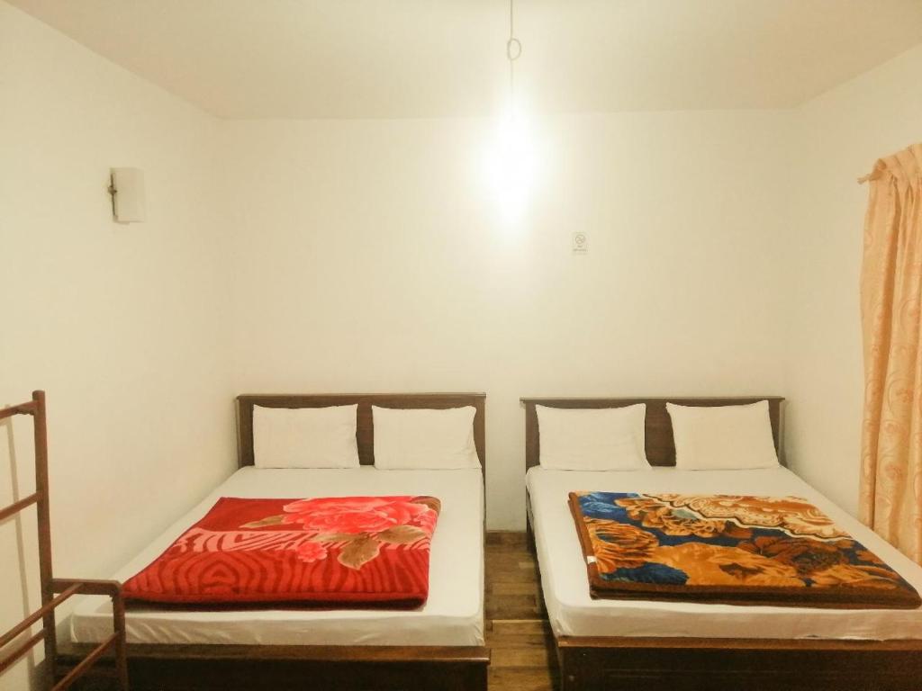 Postel nebo postele na pokoji v ubytování Glenfall Guest
