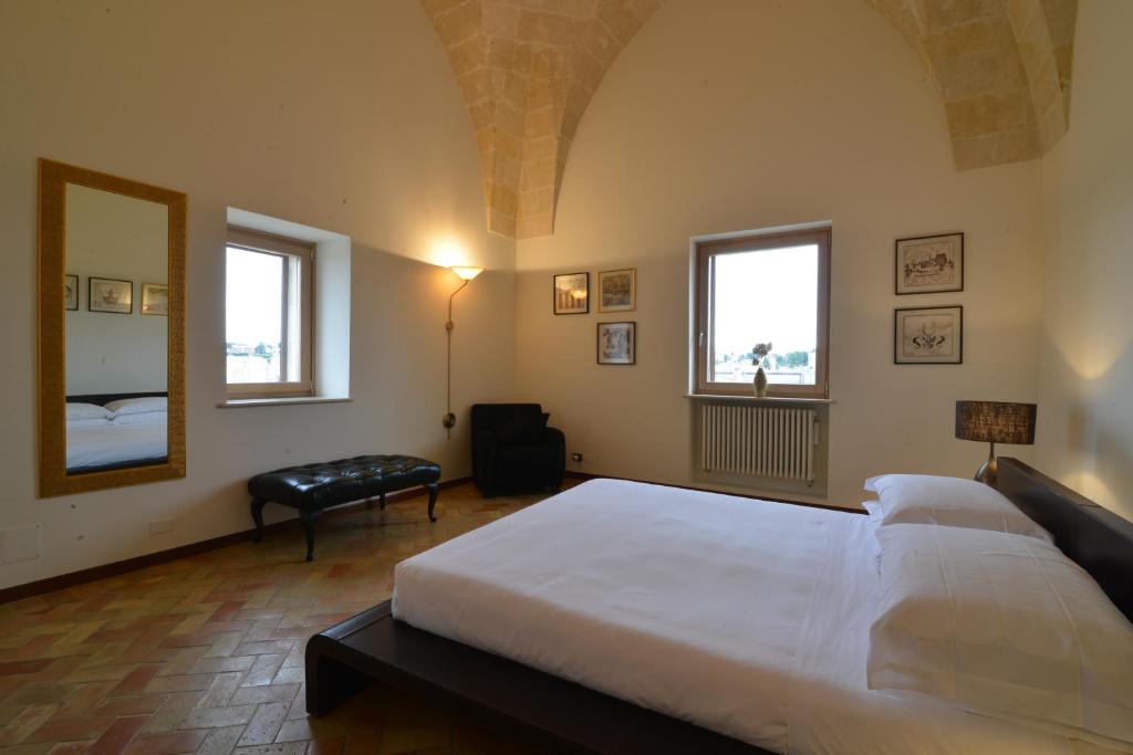 Postel nebo postele na pokoji v ubytování Antica Civita Luxury Room