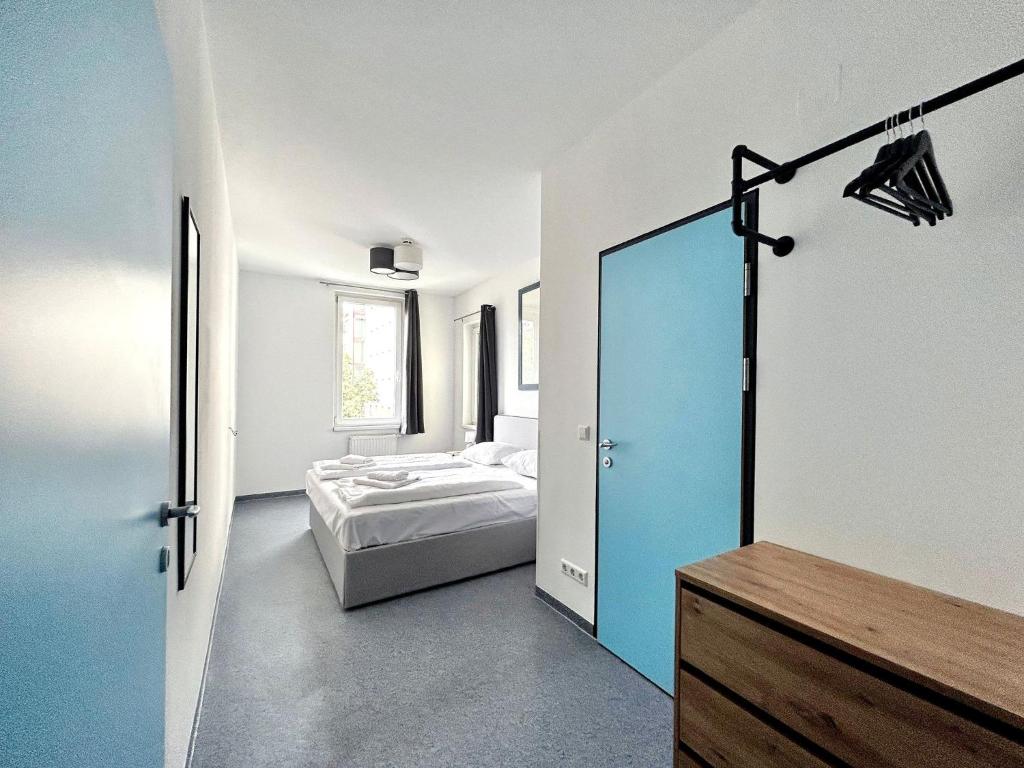 Postel nebo postele na pokoji v ubytování Hotel Astral Vienna