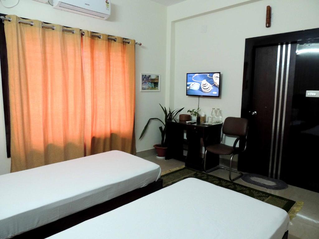 Postel nebo postele na pokoji v ubytování Sublime Homestay