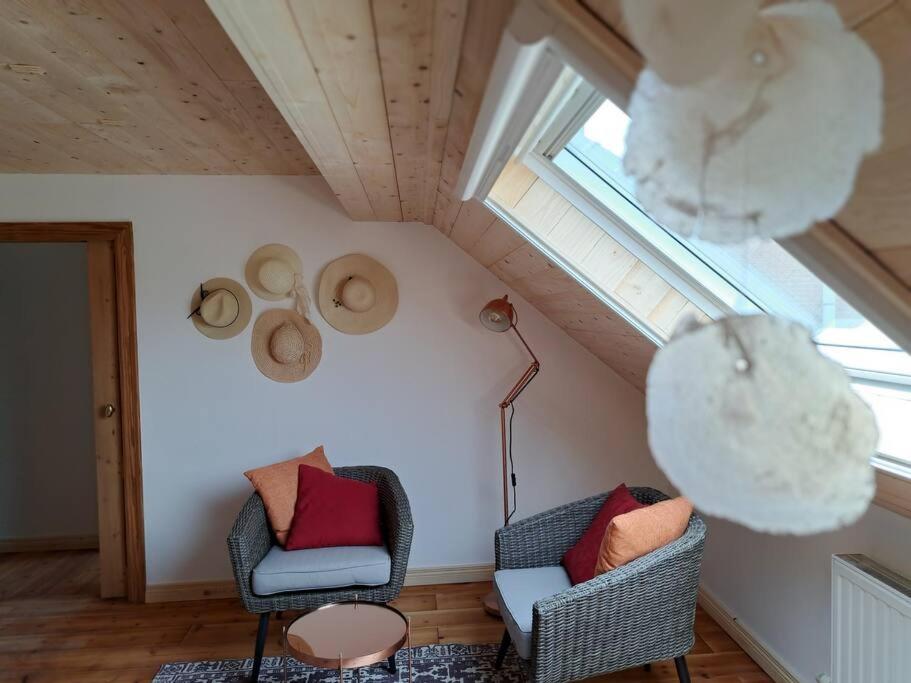Posezení v ubytování Maison Patisson