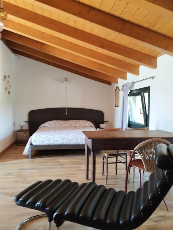 Postel nebo postele na pokoji v ubytování Agriturismo Scribano