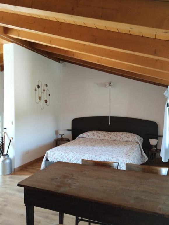 Postel nebo postele na pokoji v ubytování Agriturismo Scribano