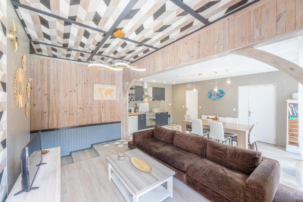 Posezení v ubytování La Maison du Bois Brûlé 3 - Avec piscine partagée