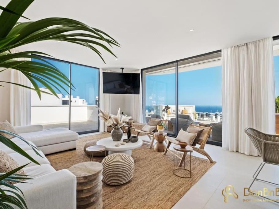 Istumisnurk majutusasutuses Ático De Lujo Con Jacuzzi En Higuerón West