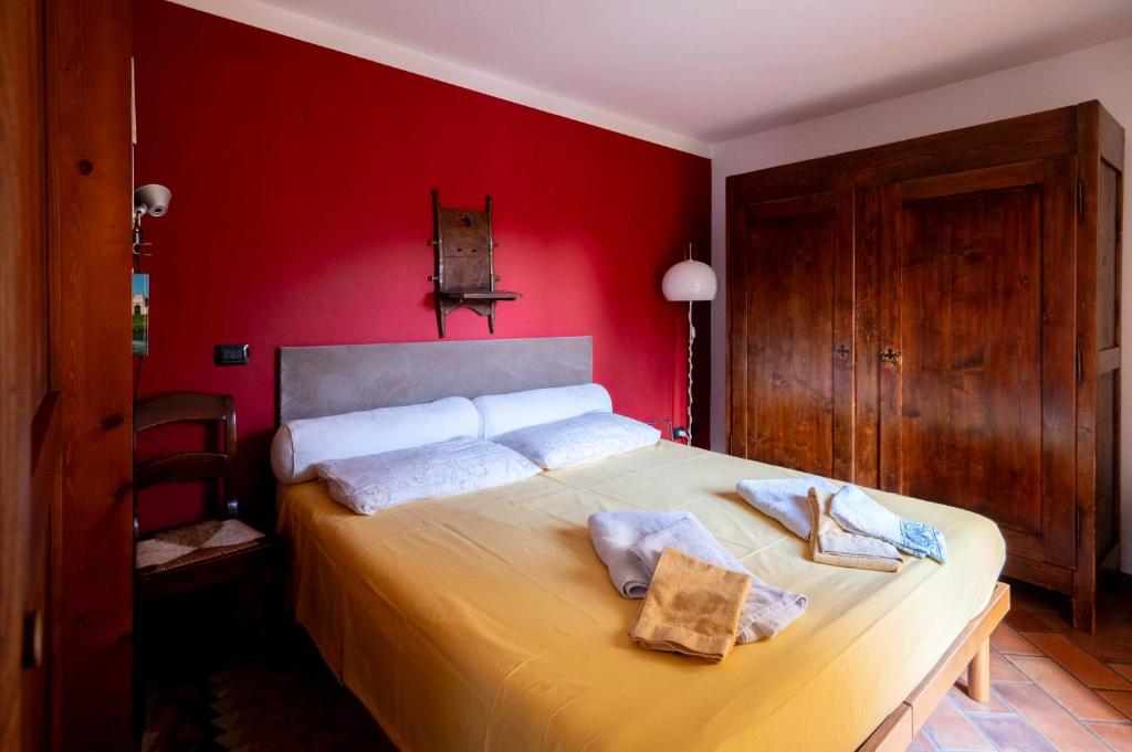 Postel nebo postele na pokoji v ubytování Agriturismo Terre Bianche