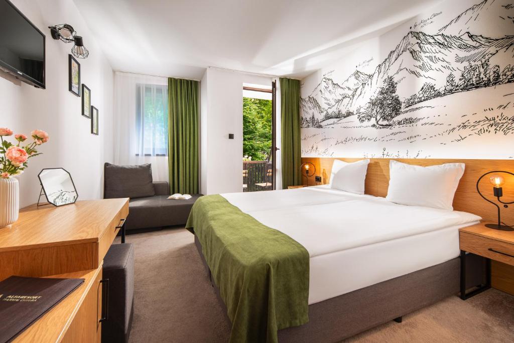 Postel nebo postele na pokoji v ubytování Hotel Alfaresort Thermal Chiflika