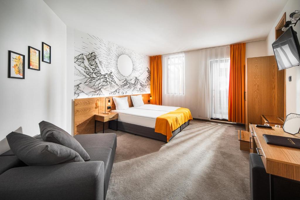 Postel nebo postele na pokoji v ubytování Hotel Alfaresort Thermal Chiflika