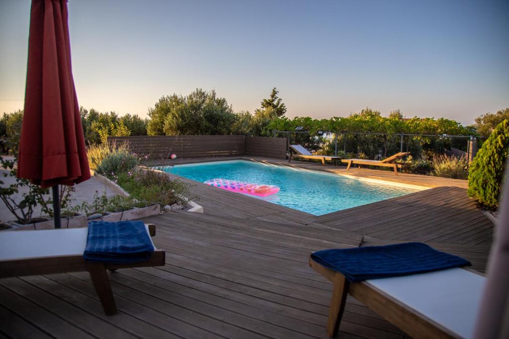Bazén v ubytování Sitia Poolside Gem - Crete's Fuego Sagrado nebo v jeho okolí