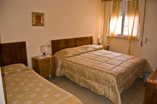 Postel nebo postele na pokoji v ubytování Hotel Delhy