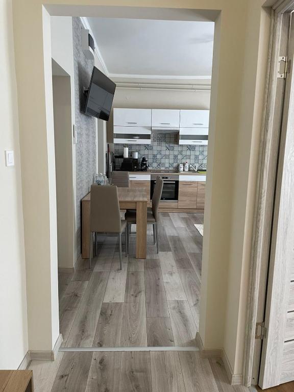 Kuchyň nebo kuchyňský kout v ubytování Tulipán Apartman