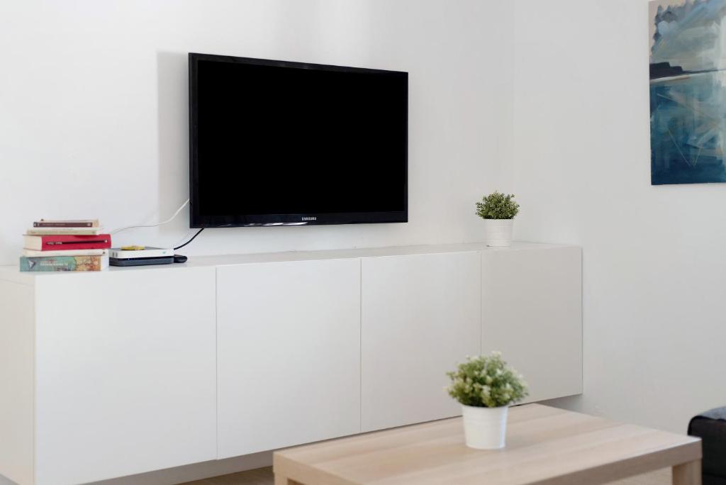 TV a/nebo společenská místnost v ubytování Balcon de Porteria