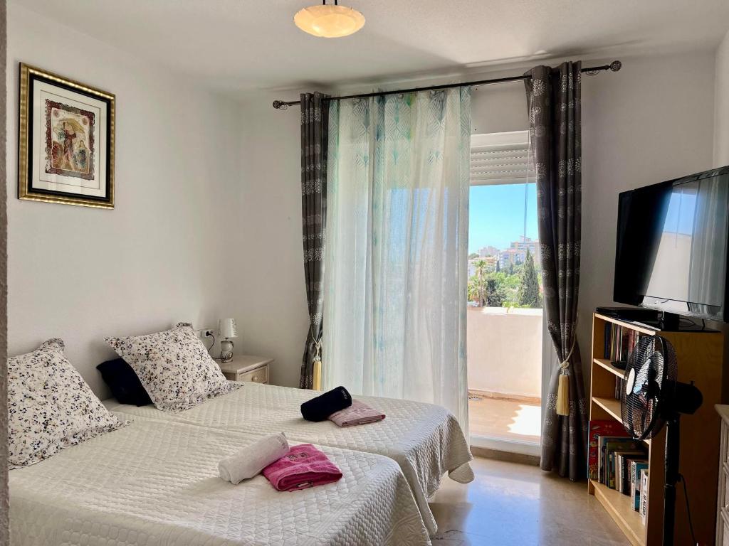 Posteľ alebo postele v izbe v ubytovaní Luxury residence near Puerto Marina