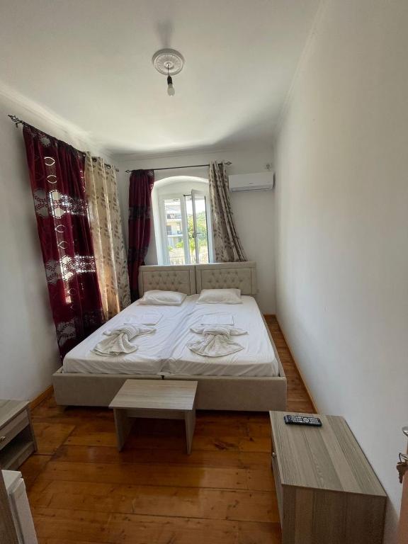 Postel nebo postele na pokoji v ubytování Little himara 1
