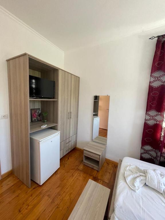 Postel nebo postele na pokoji v ubytování Little himara 1