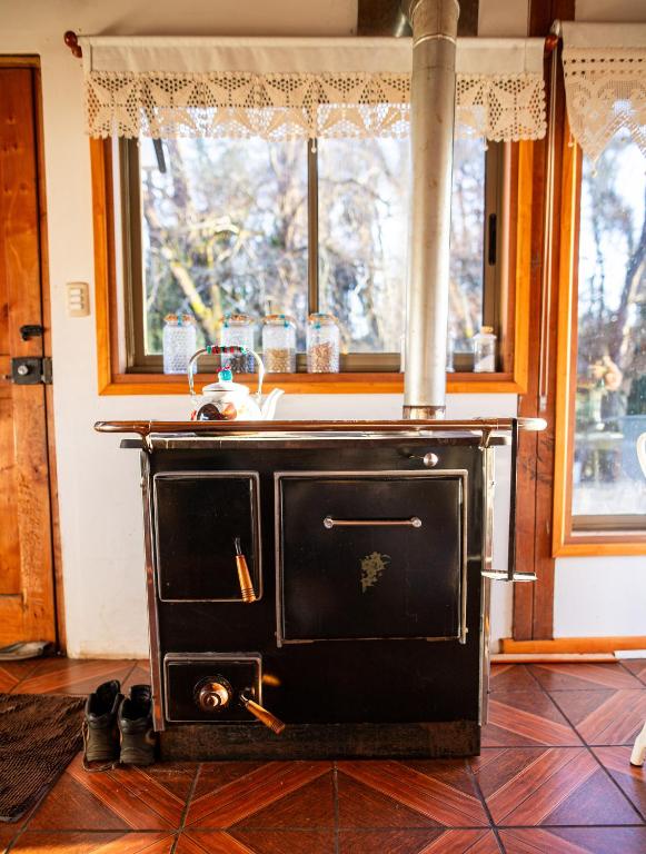 Kuchyň nebo kuchyňský kout v ubytování Hostal La Casita del Bajo