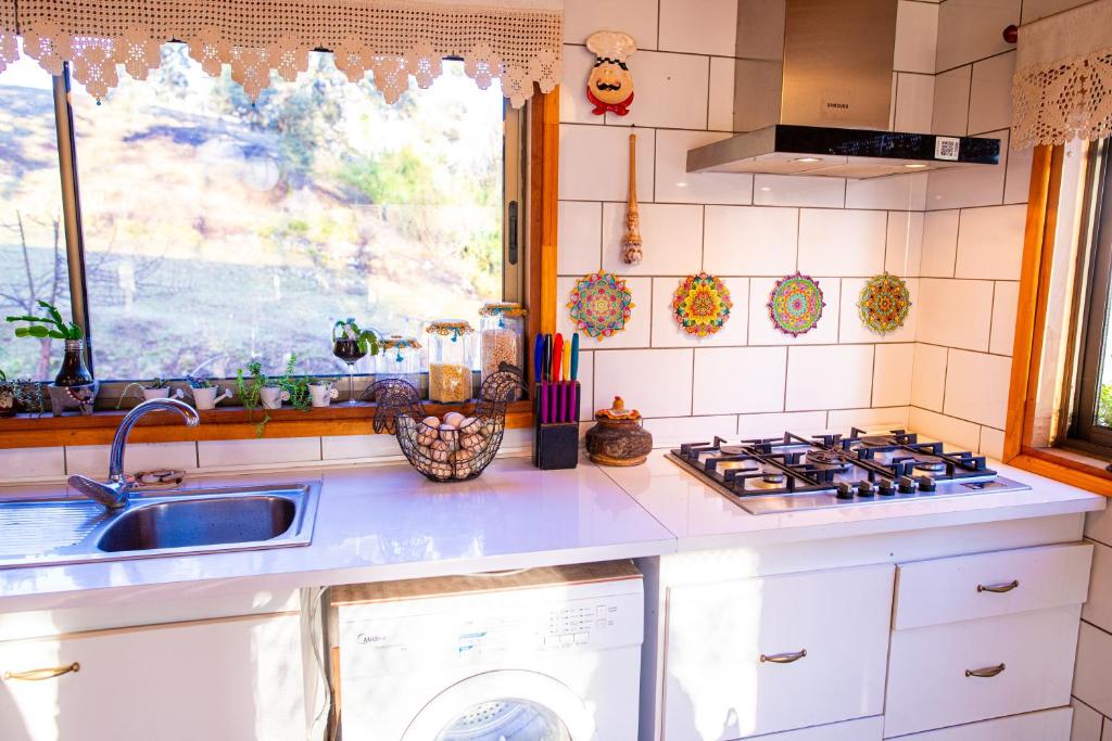 Kuchyň nebo kuchyňský kout v ubytování Hostal La Casita del Bajo
