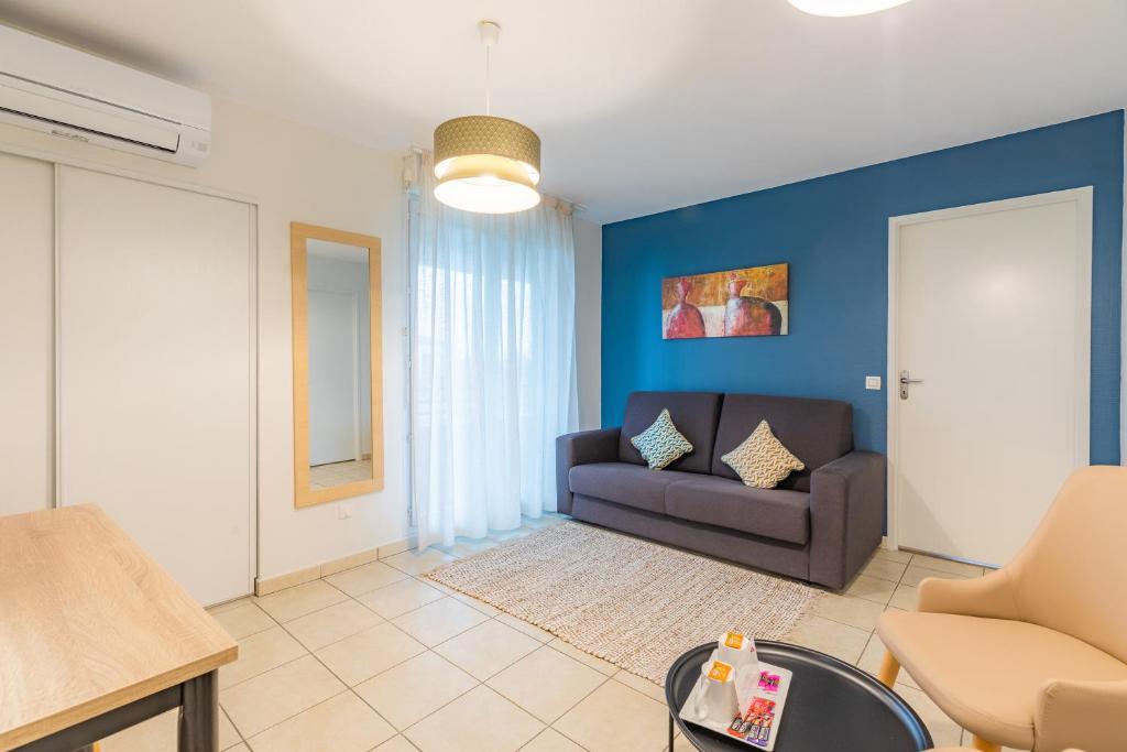 Un lugar para sentarse en Appart'City Confort Toulouse Purpan