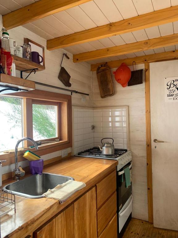Kuchyň nebo kuchyňský kout v ubytování Hermosa Tiny House con Vista al Chapelco