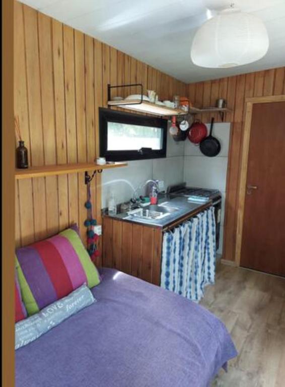 Postel nebo postele na pokoji v ubytování Hermosa Tiny House con Vista al Chapelco