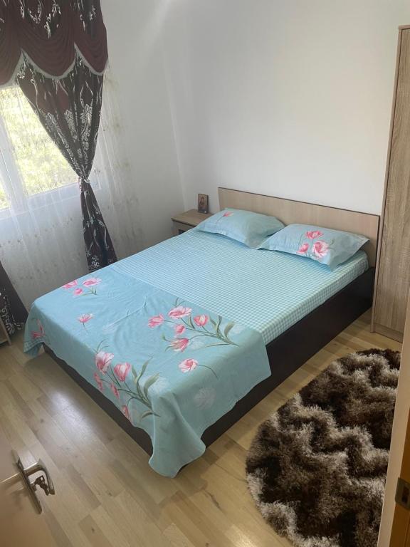 Ένα ή περισσότερα κρεβάτια σε δωμάτιο στο Apartament NEPTUN