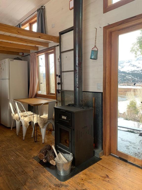 Kuchyň nebo kuchyňský kout v ubytování Hermosa Tiny House con Vista al Chapelco