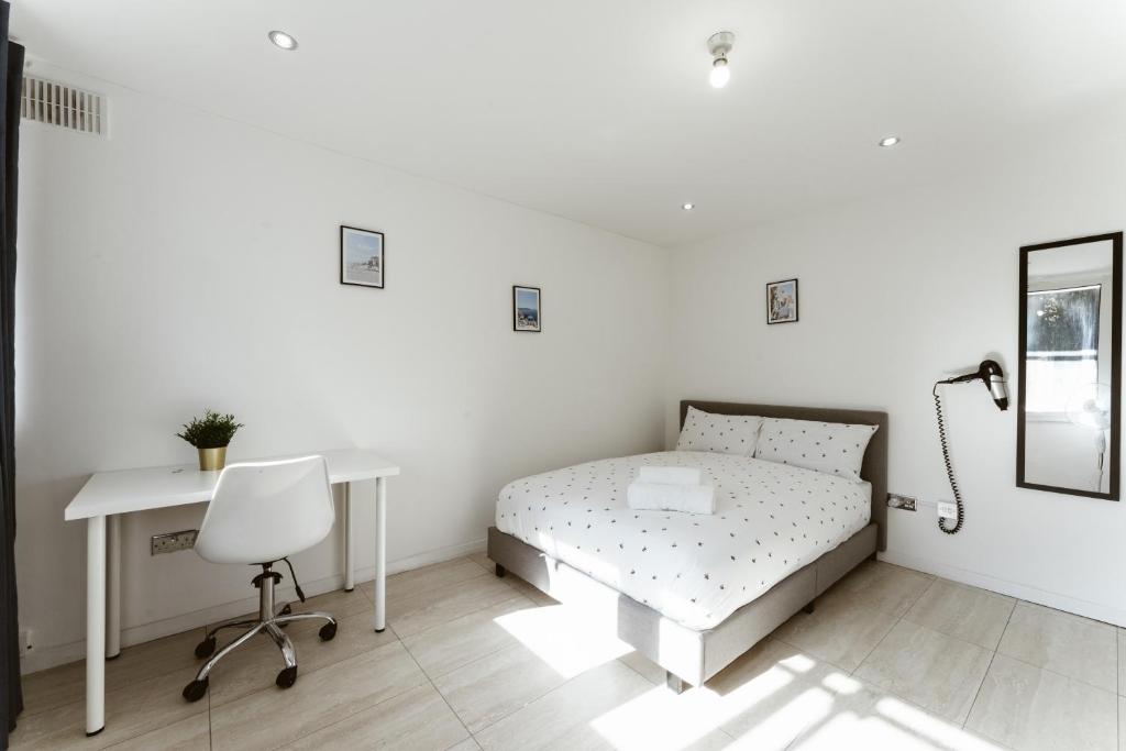 Postel nebo postele na pokoji v ubytování Stratford Cosy rooms - 17