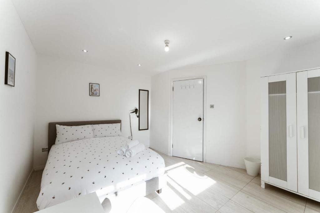 Postel nebo postele na pokoji v ubytování Stratford Cosy rooms - 17