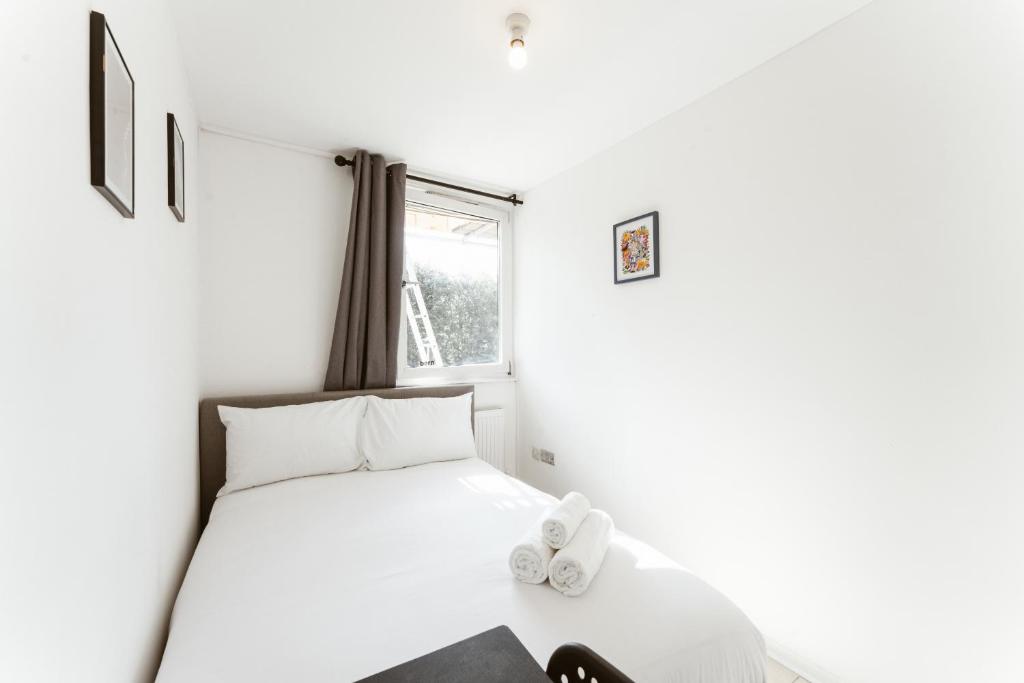 Postel nebo postele na pokoji v ubytování Stratford Cosy rooms - 17