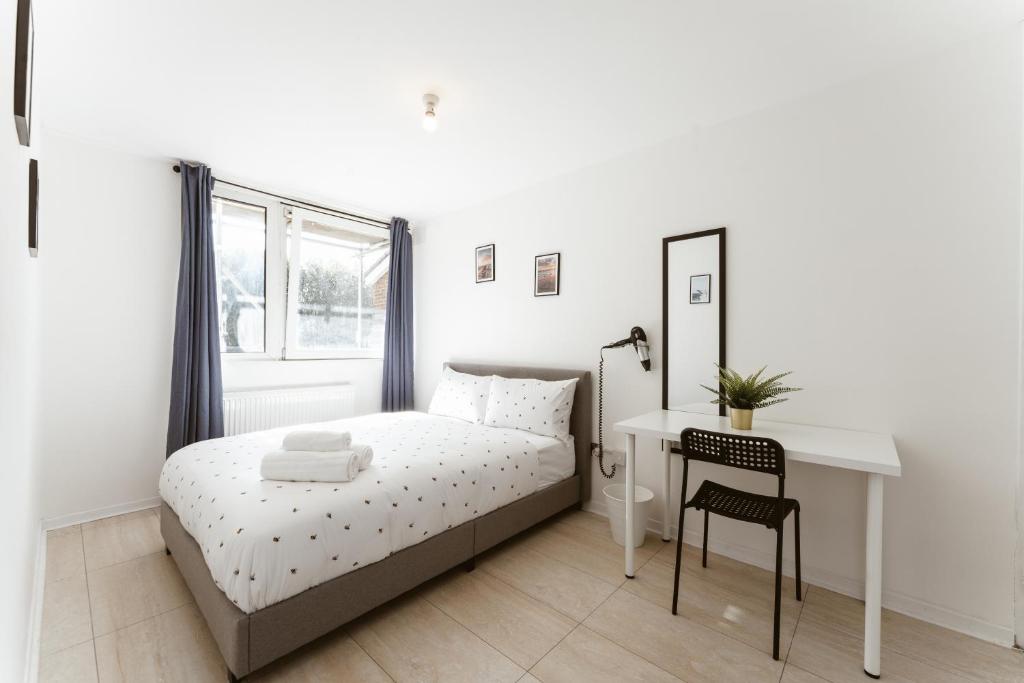 Postel nebo postele na pokoji v ubytování Stratford Cosy rooms - 17