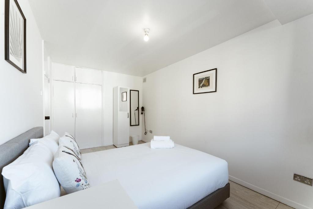 Postel nebo postele na pokoji v ubytování Stratford Cosy rooms - 17