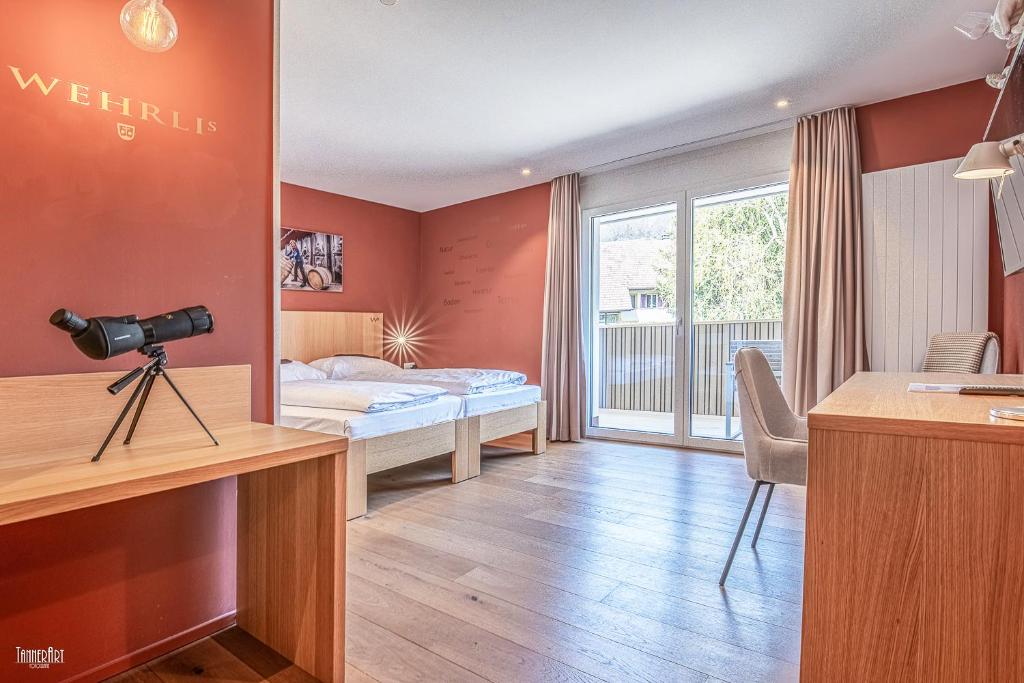 Postel nebo postele na pokoji v ubytování Hirschen Erlinsbach Swiss Quality