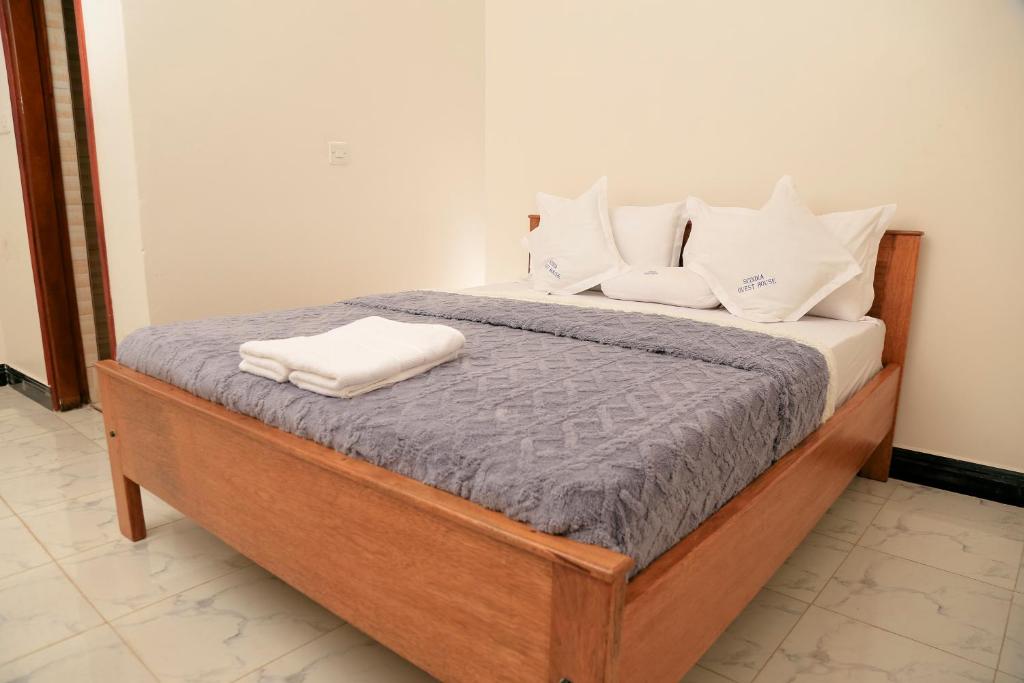 Postel nebo postele na pokoji v ubytování Scindia Suites hotel