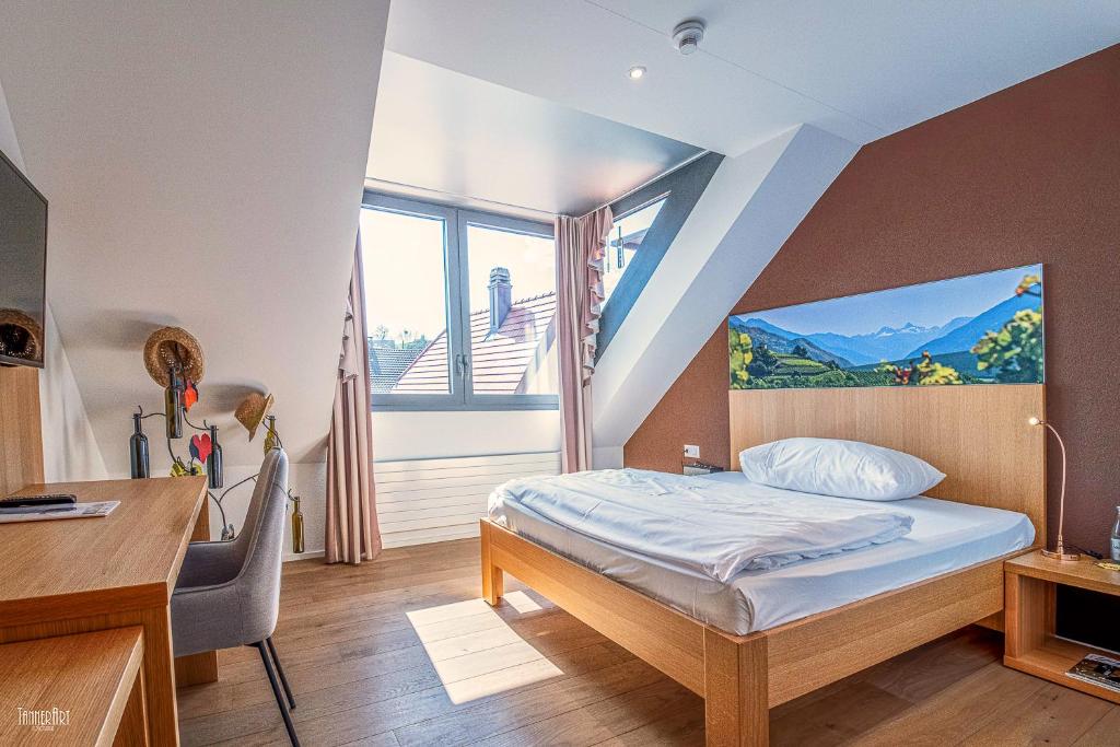 Postel nebo postele na pokoji v ubytování Hirschen Erlinsbach Swiss Quality