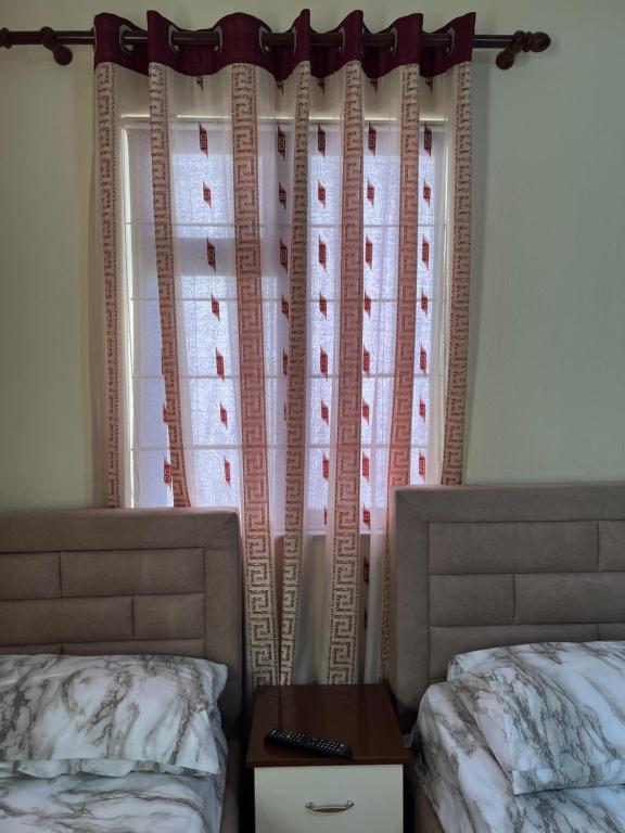 Postel nebo postele na pokoji v ubytování Berberi Guest House