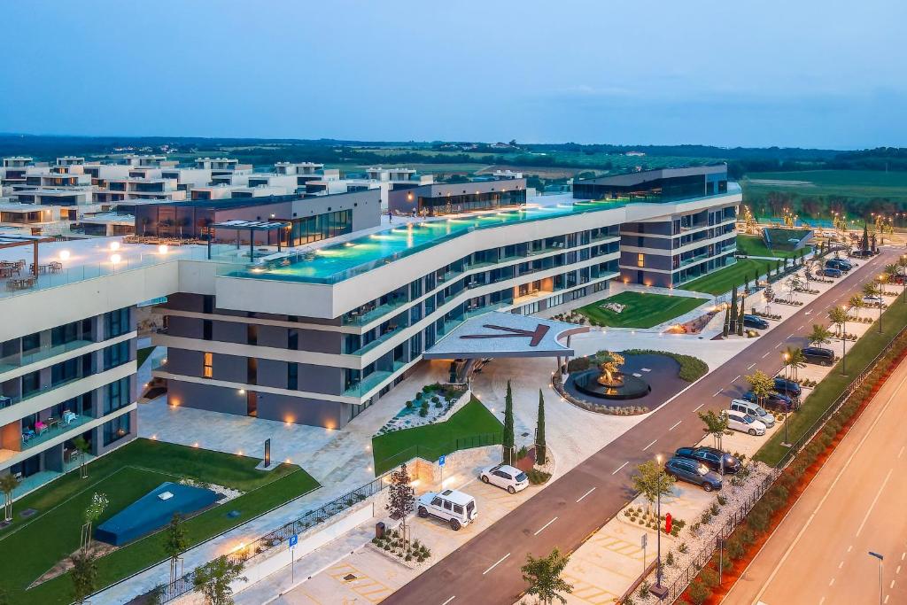 an overhead view of a large building with a street at Petram Resort & Residences in Savudrija