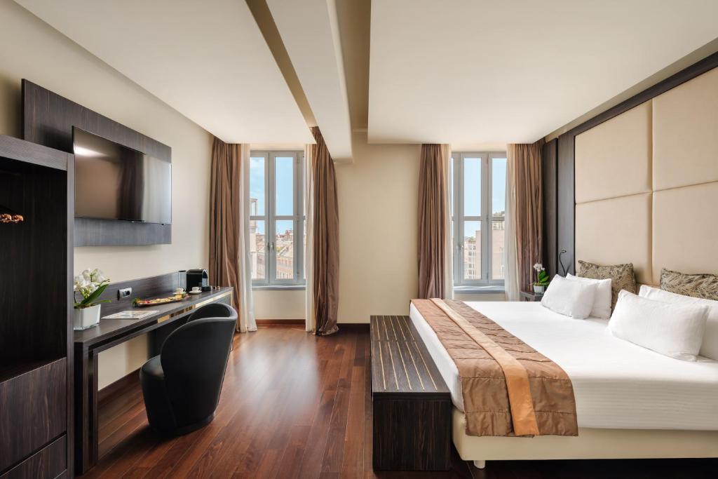 A bed or beds in a room at Hotel The Square Milano Duomo - Preferred Hotels & Resorts