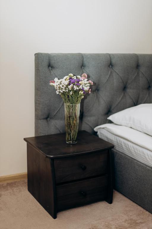 Postel nebo postele na pokoji v ubytování Eduard Hotel