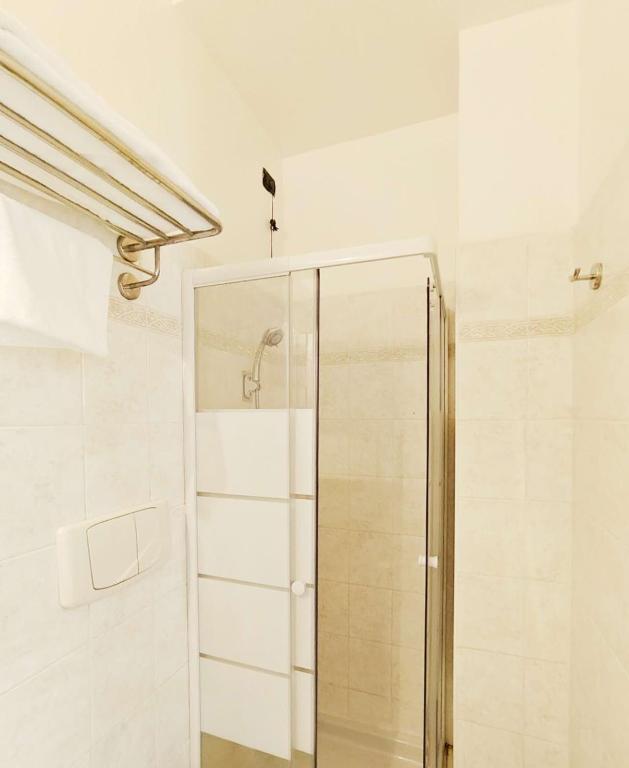 Koupelna v ubytování Hotel Mondial
