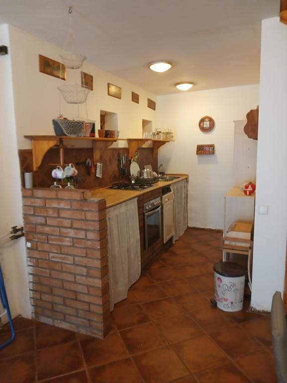 Kuchyň nebo kuchyňský kout v ubytování Patak apartman
